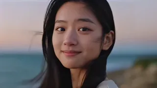 A young woman stands in the wind at dusk, her face gently turned, hair blowing across her cheek, with a quiet, natural smile that slowly fades to reveal subtle fatigue and emotion.