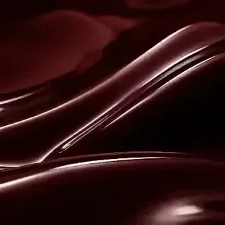 Ultra-luxury fashion commercial featuring a glossy burgundy patent leather handbag with polished gold hardware, presented with cinematic lighting and reflections.