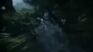 First-person view diving through a dark, ancient jungle temple with vines and statues, emerging into a bright underground sun with levitating stone rings.