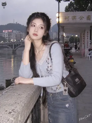 A young person in stylish early 2000s Chinese county town attire, posing with a vintage flip phone against a backdrop of typical street scenes and shops, captured with a distinct early digital camera look.