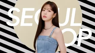 A stylish Korean fashion girl posing in a graphic magazine world with geometric patterns and bold typography.