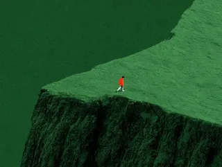 A tiny figure in a red jacket walks along the edge of a massive, textured green cliff in a minimalist cinematic landscape.