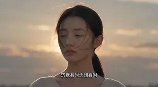 A young East Asian girl with soft, loose hair is bathed in the warm, orange glow of a setting sun, her face showing a gentle, almost imperceptible smile with a hint of sadness in h