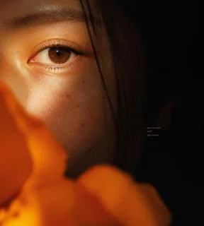 Close-up details of a person, food, and flowers, conveying emotion for brand visuals.