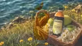 A luxury apple beverage commercial sequence, featuring close-ups of apples, product shots, and a woman enjoying the drink in a garden.