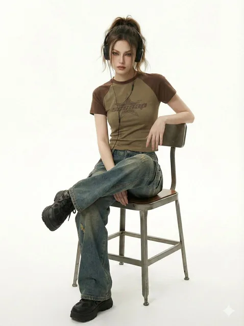 She kneels in a pristine white studio, shot from a low mid angle with a slight upward tilt that emphasizes quiet dominan