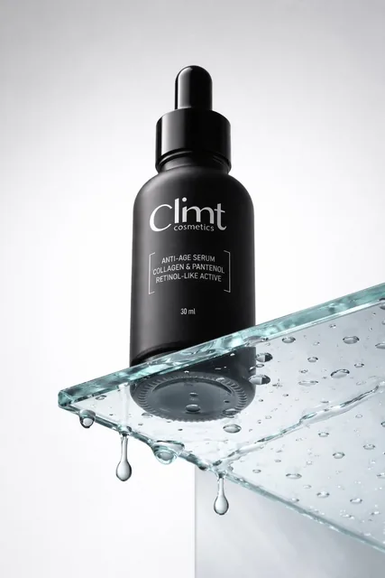 Commercial luxury product photography, photorealistic, ultra high detail, 8K quality. A minimalist matte black cosmetic