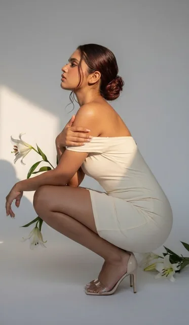 Role: high-end fashion editorial photographer shooting a luxury minimalist studio campaign, ultra-realistic photography