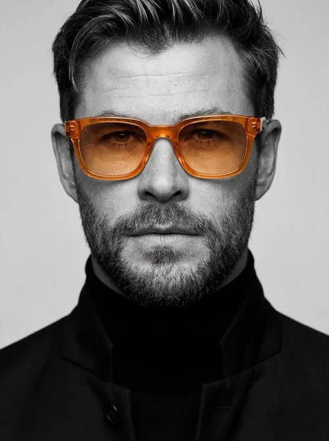 Ultra-realistic studio portrait of a man, close-up headshot, centered composition, neutral expression, sharp facial deta