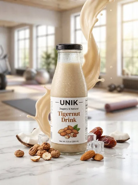 Ultra-realistic lifestyle beverage advertisement featuring a chilled bottle of “UNIK – Jaggery & Natural Tigernut Drink.