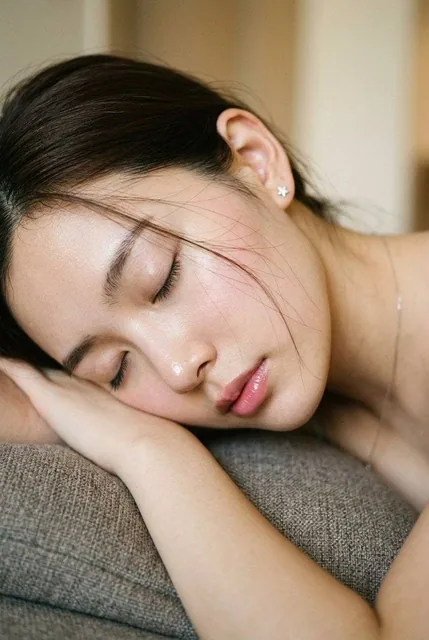 { "subject": { "description": "Extreme close-up profile portrait of a young woman resting.", "mirror_rules": null, "age"