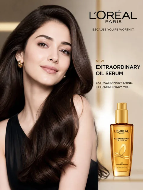 A 25 year old beautiful women with beautiful long hairs and flawless white skin doing a photoshoot for Loreal Paris.