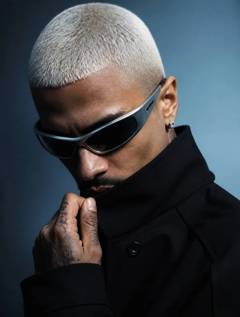 A realistic photograph of a man posed in a high-fashion editorial studio portrait, his head tilted downward and angled s