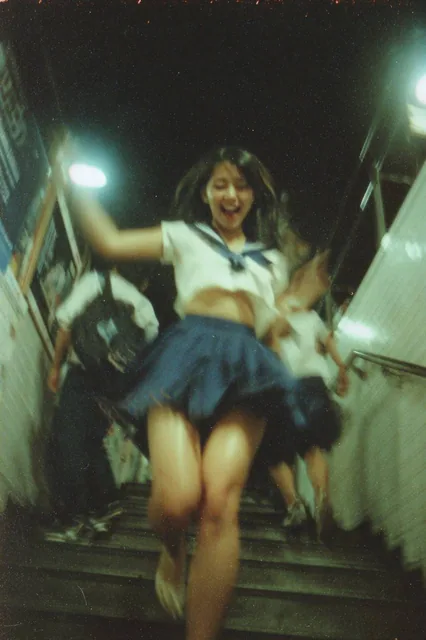 instant camera shot of a japanese high school girl