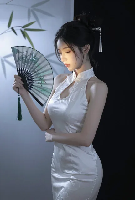An elegant female portrait blending Eastern aesthetics with modern photography, featuring a woman in a white translucent qipao holding a fan, set against a backdrop with bamboo shadows and soft lighting, embodying a pure desire style with subtle sensuality.