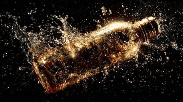 A subject suspended in a mid-splash of metallic liquid, with frozen motion capturing mercury and gold droplets in zero gravity. Hyper-crisp detail shows liquid tension under dramatic side lighting, creating a scene of luxurious chaos in editorial beauty photography style.