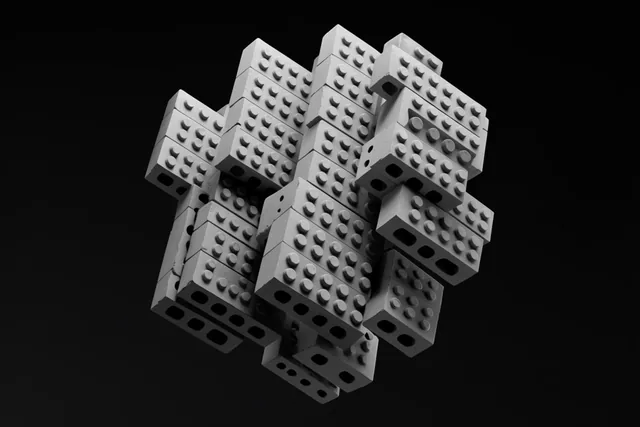 A monochromatic 3D cluster of staggered gray construction bricks suspended against a solid blac...