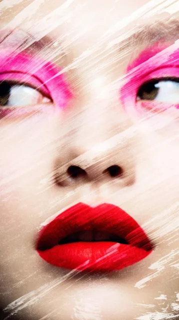 An extreme close-up portrait of a face obscured by heavy, diagonal scratch marks and sweeping b...