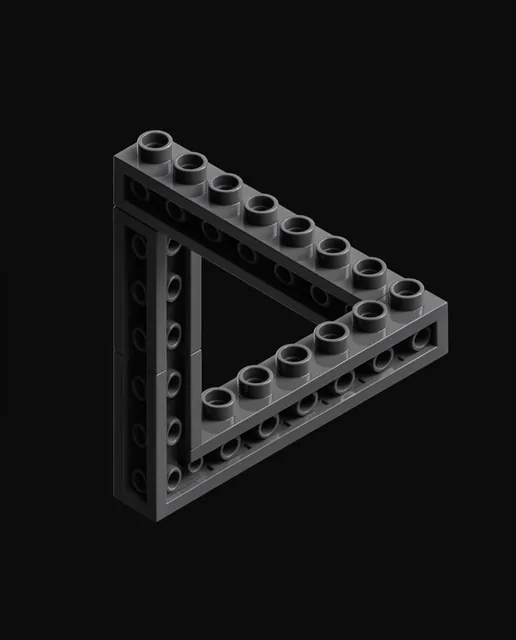 A Penrose triangle optical illusion constructed from dark grey interlocking plastic building bl...