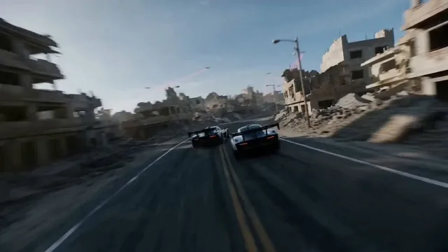 FPV drone camera chasing a pack of 2 racing cars speeding together on a super narrow curvy road in a ruined apocalyptic