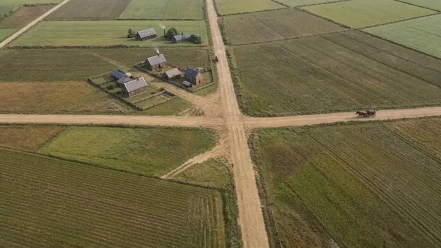 Timelapse prompt on Seedance 2 : Locked-off aerial timelapse of the exact same landscape across centuries, with the came