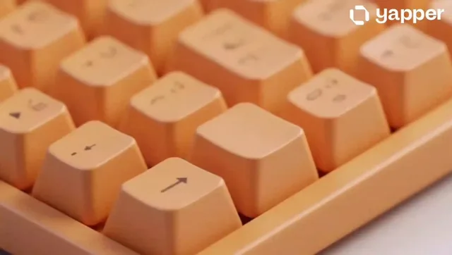A 15-second continuous macro shot of a sleek, matte pastel-orange mechanical keyboard. Suddenly, one of the central keyc