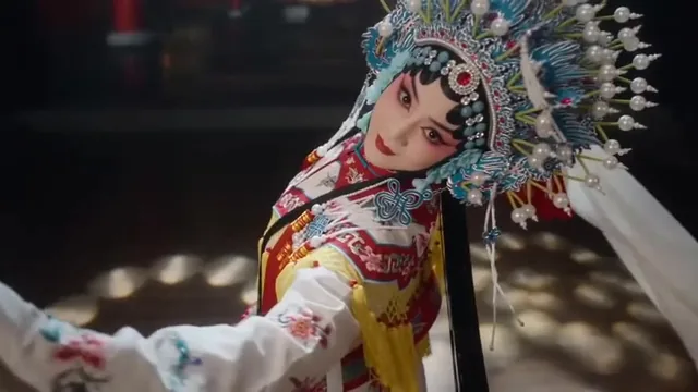 Replace the woman in @Video1 with a Peking opera dan. Set the scene on an exquisite stage. Reference @Video1 for camera