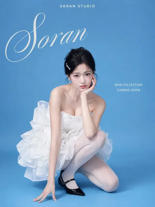 Minimalist fashion poster with a young East Asian woman in a white dress, crouching on a blue seamless background. Brand name 'SORAN' and title 'Bowee' are integrated into the design.
