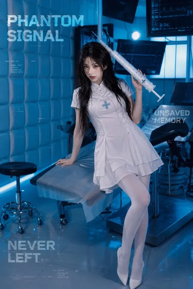 A woman with long black hair and a detached expression, wearing a white futuristic medical uniform, stands in a dimly lit, high-tech laboratory with screens and equipment. She holds a large syringe prop. Glitchy text overlays the image.