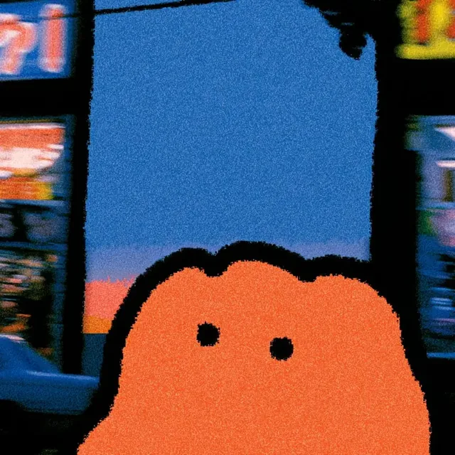 A fuzzy orange cartoon character with two black eyes looks out from behind a large blue rectangle, with blurred neon signs in the background.